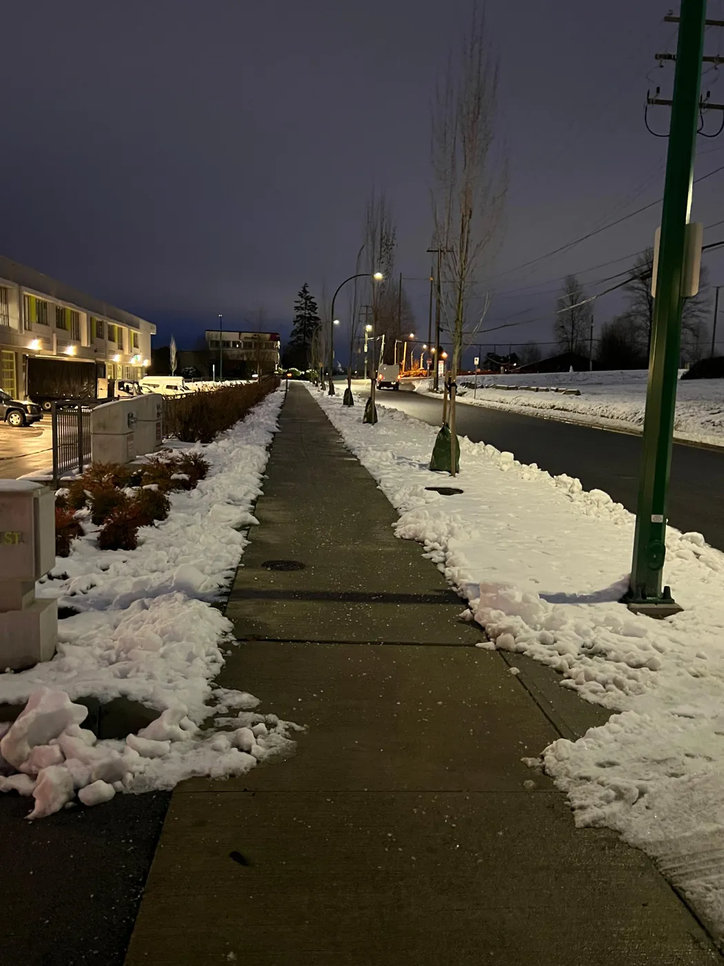 Open pedestrian route alongside a commercial property