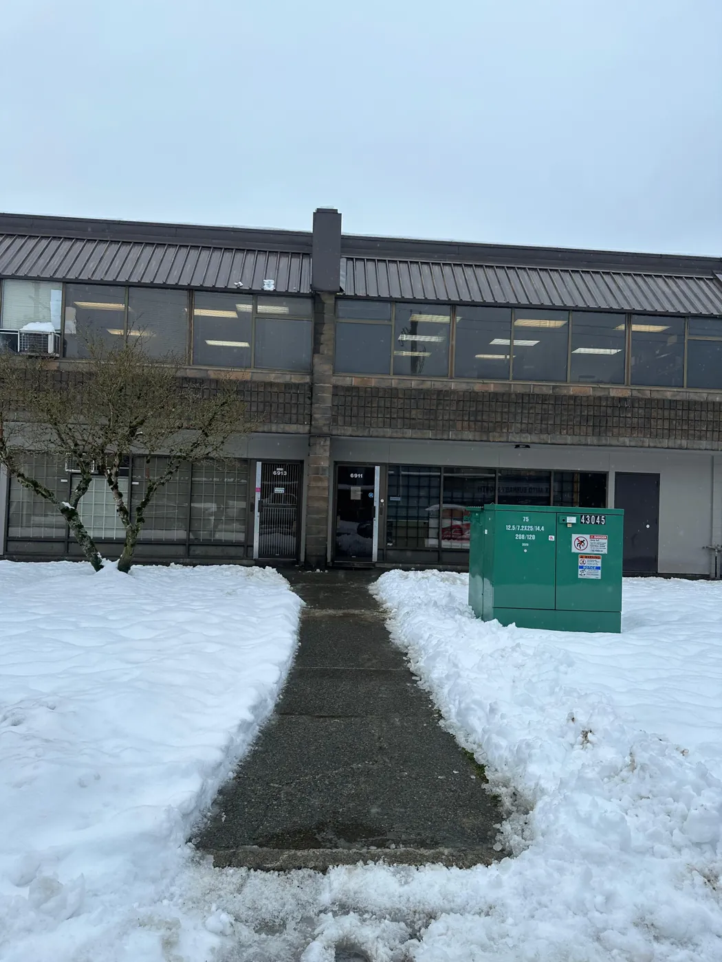 Cleared walkway to commercial building entrances
