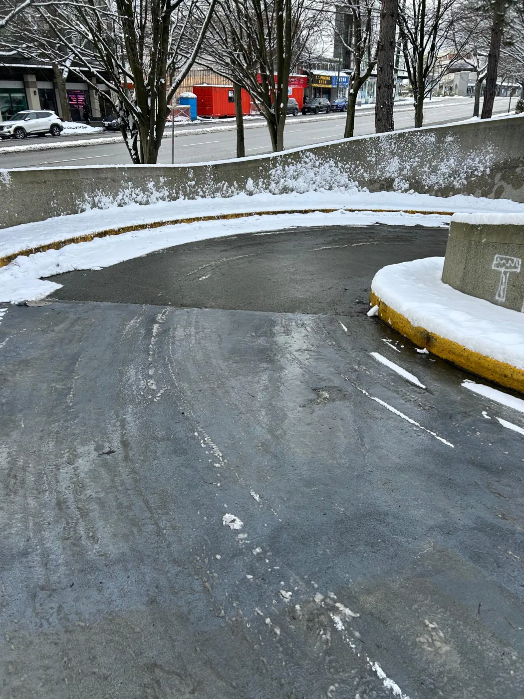 Cleared curved access ramp after snowfall